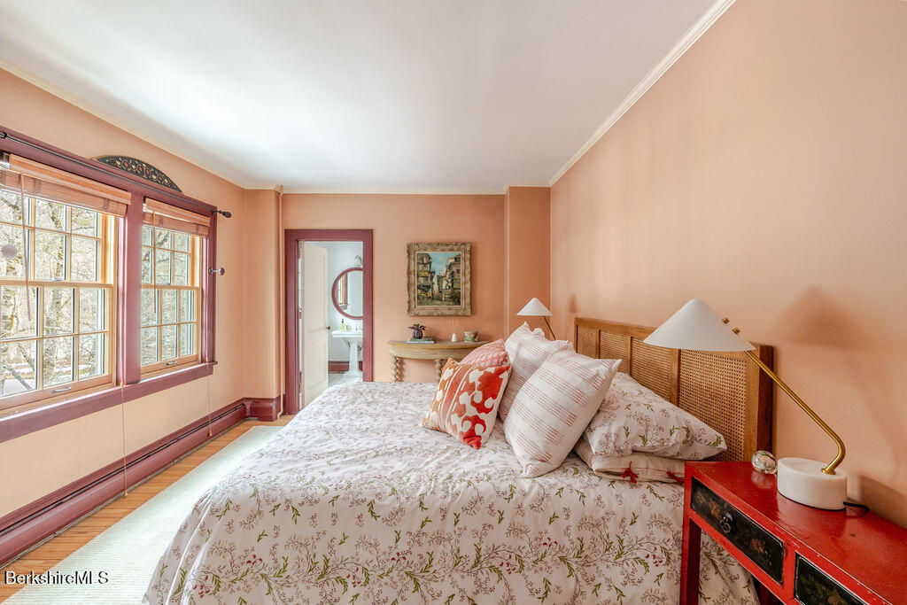 17 Cronk Road Monterey, MA 01245 - Photo 23 of 65 a bedroom with a large bed and a window