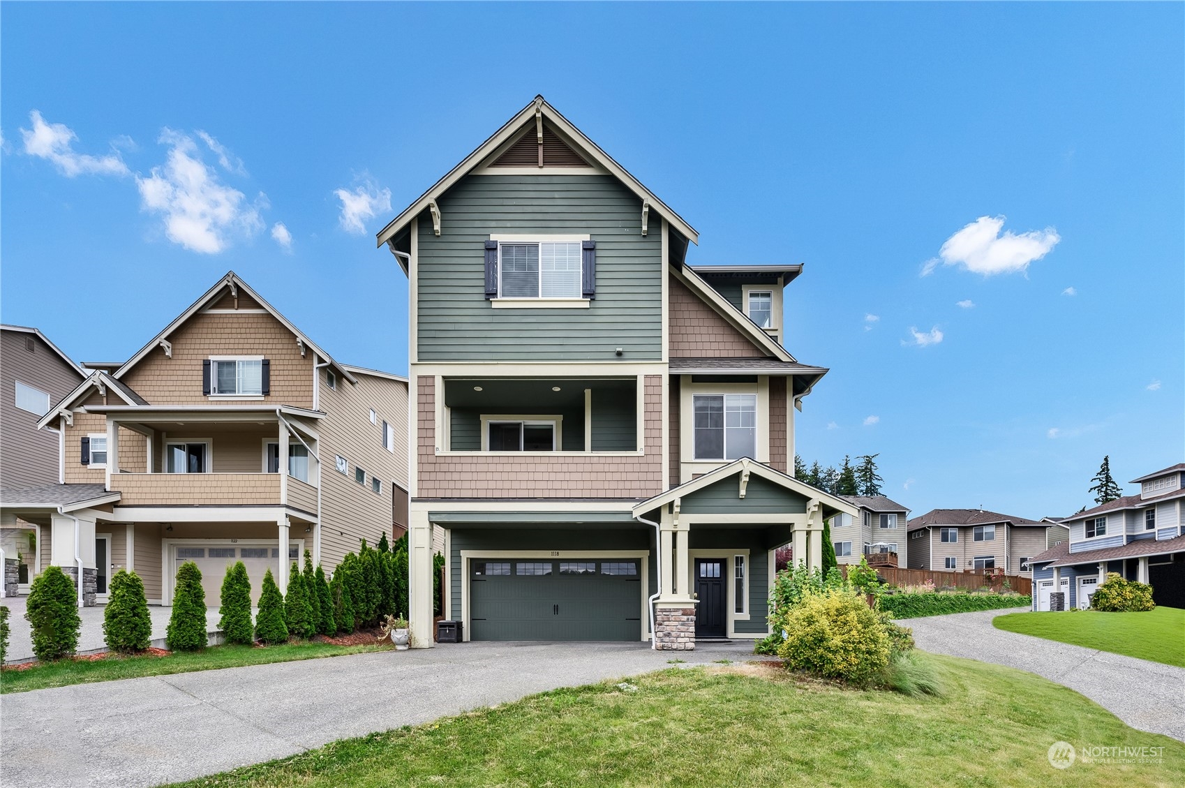 1118 Southwest 338th Street Federal Way, WA 98023 - Photo 1 of 25 a front view of a house with a yard