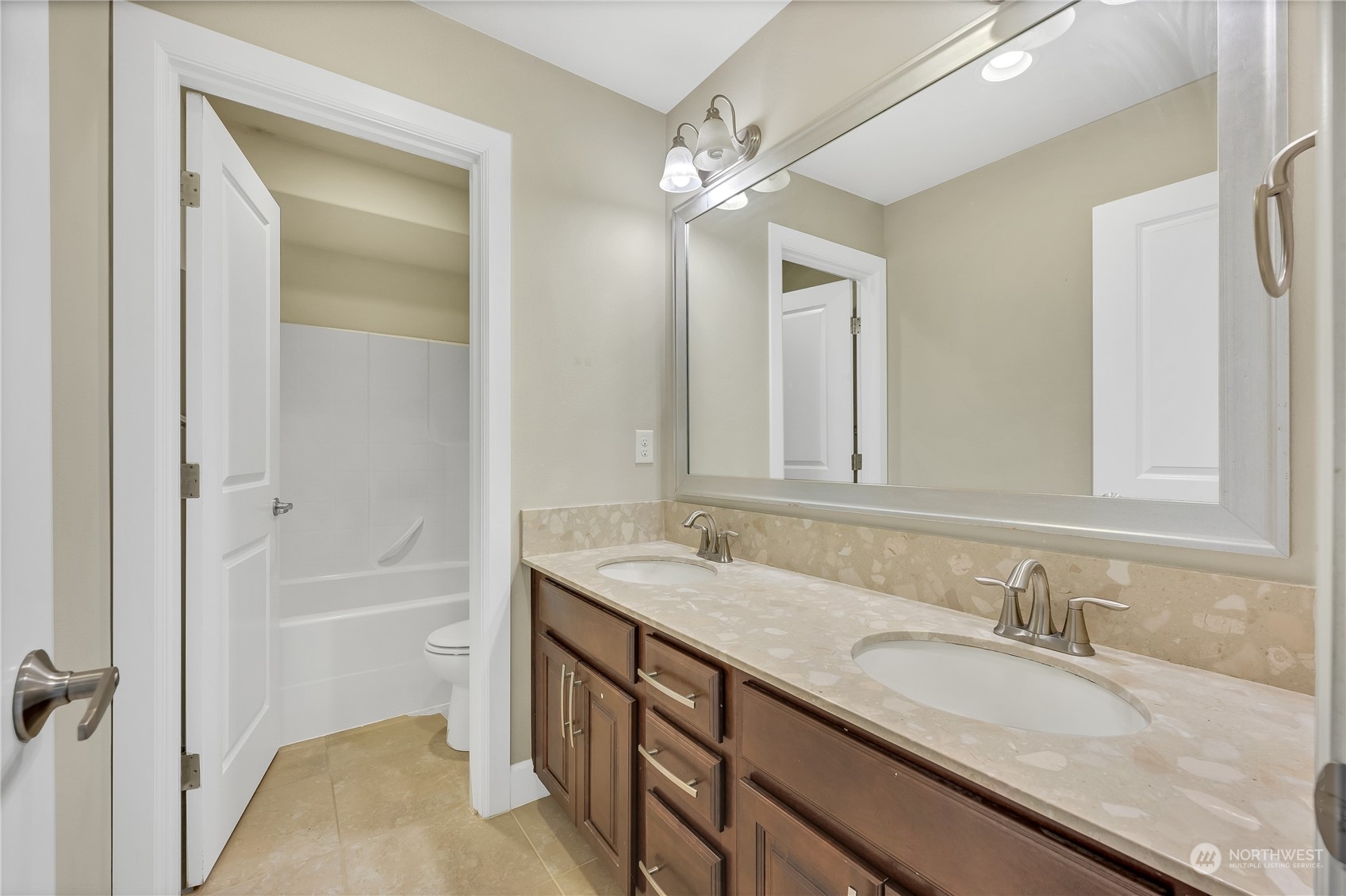 1118 Southwest 338th Street Federal Way, WA 98023 - Photo 19 of 25 a bathroom with a granite countertop sink mirror and a