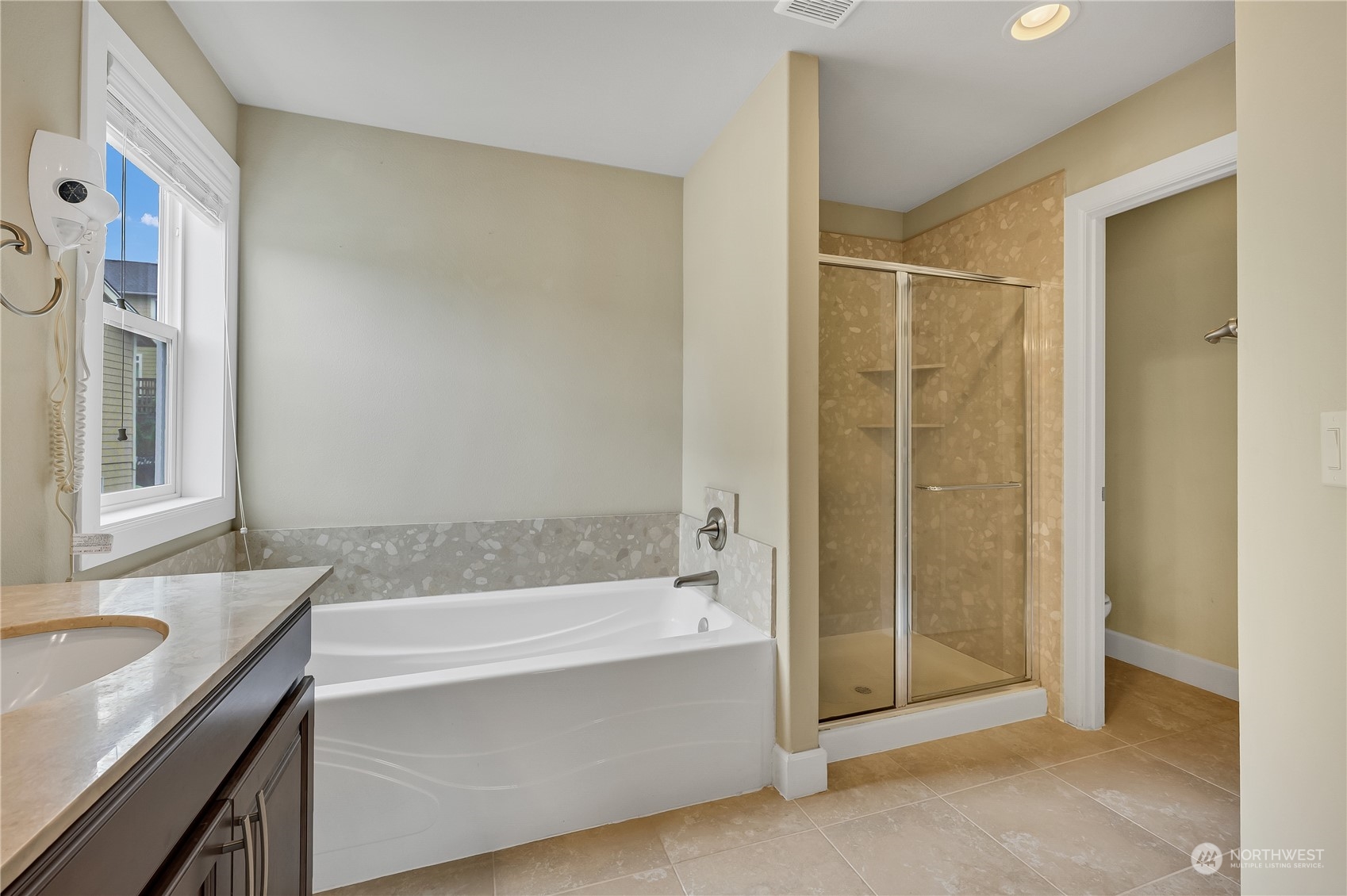 1118 Southwest 338th Street Federal Way, WA 98023 - Photo 23 of 25 a bathroom with a bathtub and a sink