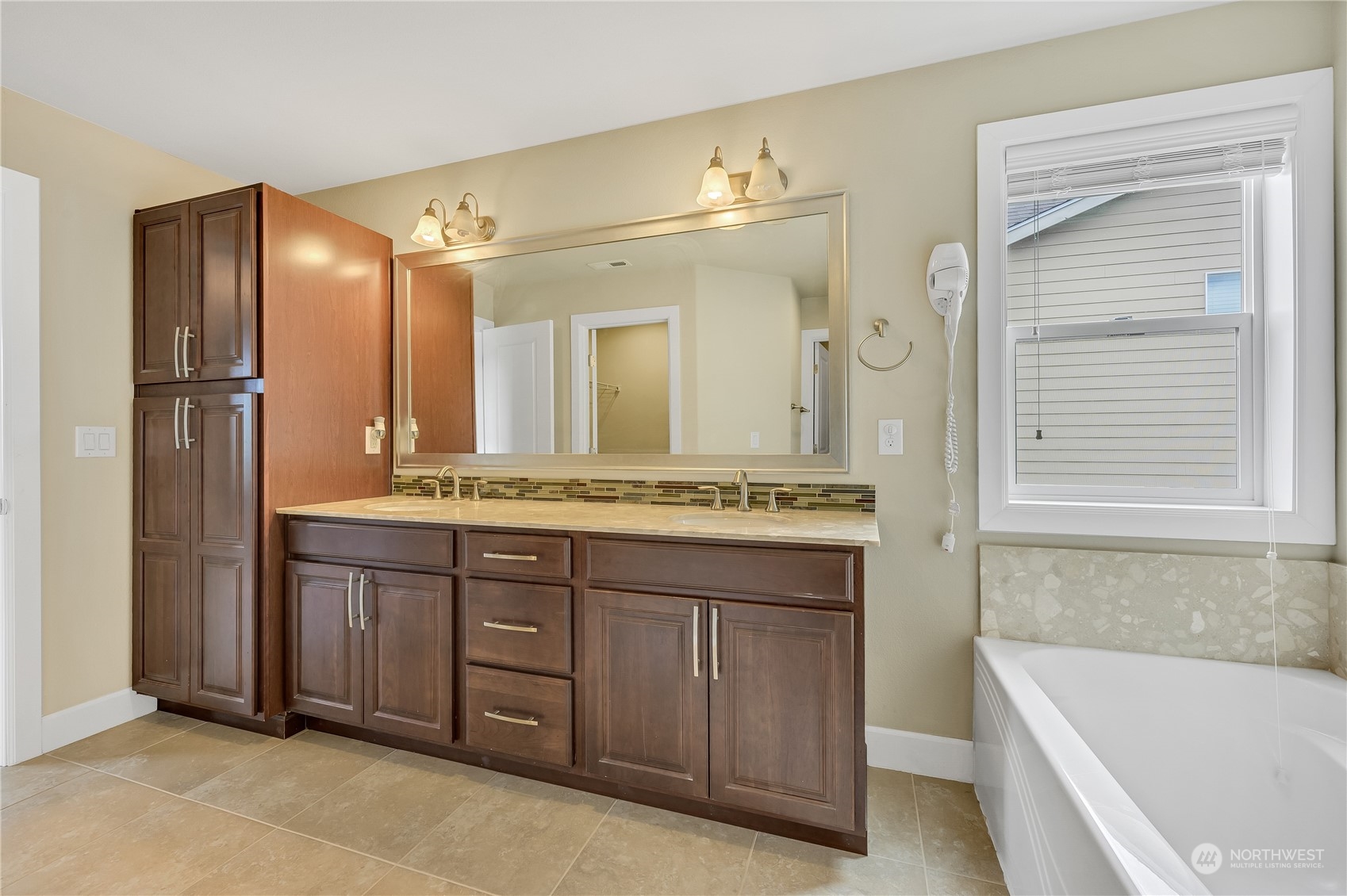 1118 Southwest 338th Street Federal Way, WA 98023 - Photo 24 of 25 a bathroom with a granite countertop double vanity sink mirror and bathtub