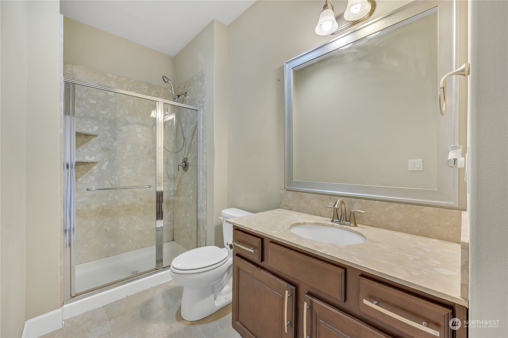 1118 Southwest 338th Street Federal Way, WA 98023 - Photo 4 of 25 a bathroom with a shower sink vanity granite and toilet