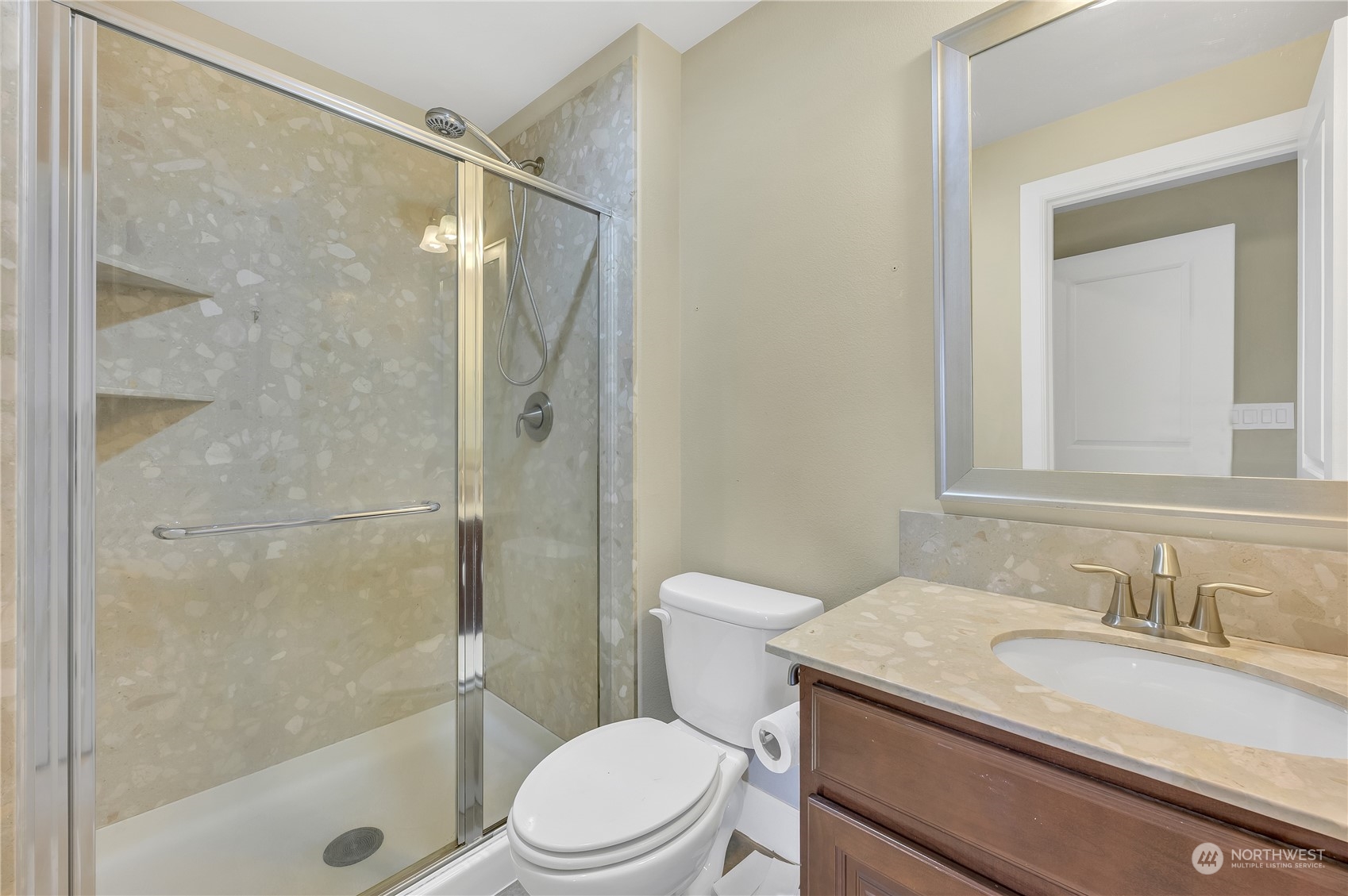 1118 Southwest 338th Street Federal Way, WA 98023 - Photo 5 of 25 a bathroom with a granite countertop sink toilet and shower