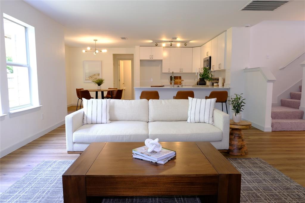 3437 Caprock Ranch Road Fort Worth, TX 76262 - Photo 6 of 27 a living room with furniture and a table