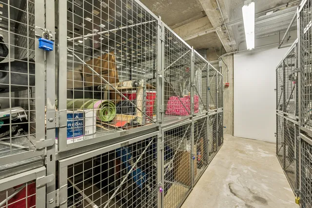 a view of parking garage with cars