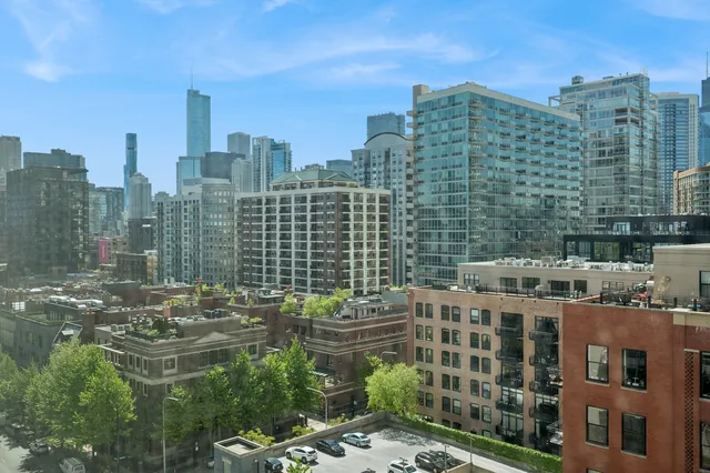 an aerial view of a house with outdoor space