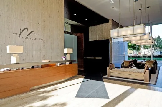 a view of two chairs in a balcony