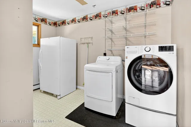 a utility room with dryer and washer