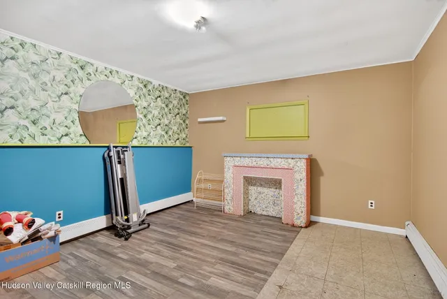 wooden floor fireplace and natural light