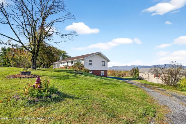 a house view with a garden space