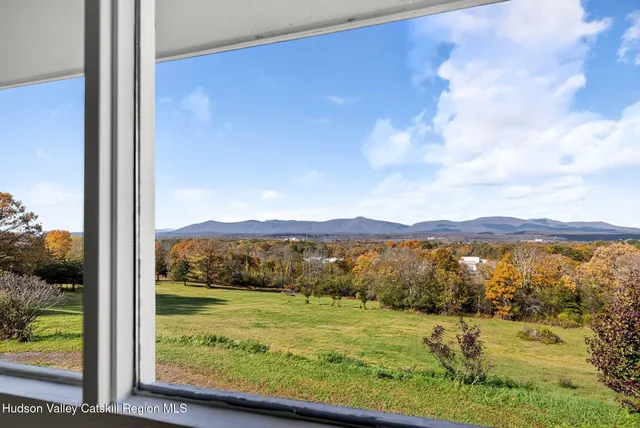 a view of lake and mountain