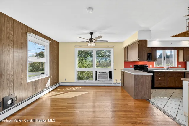 a large living room with a large window