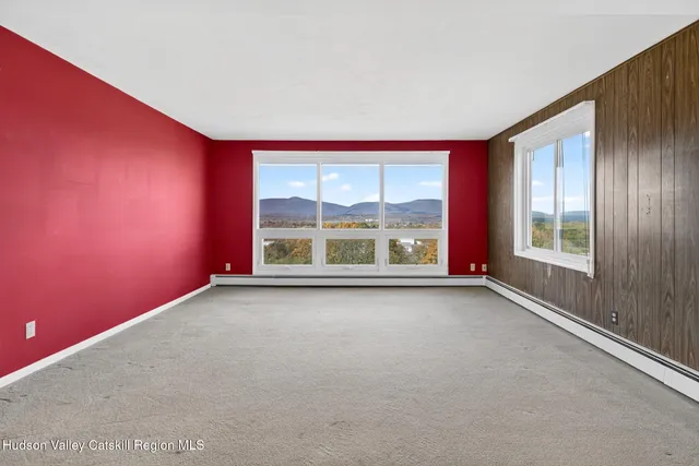 an empty room with windows