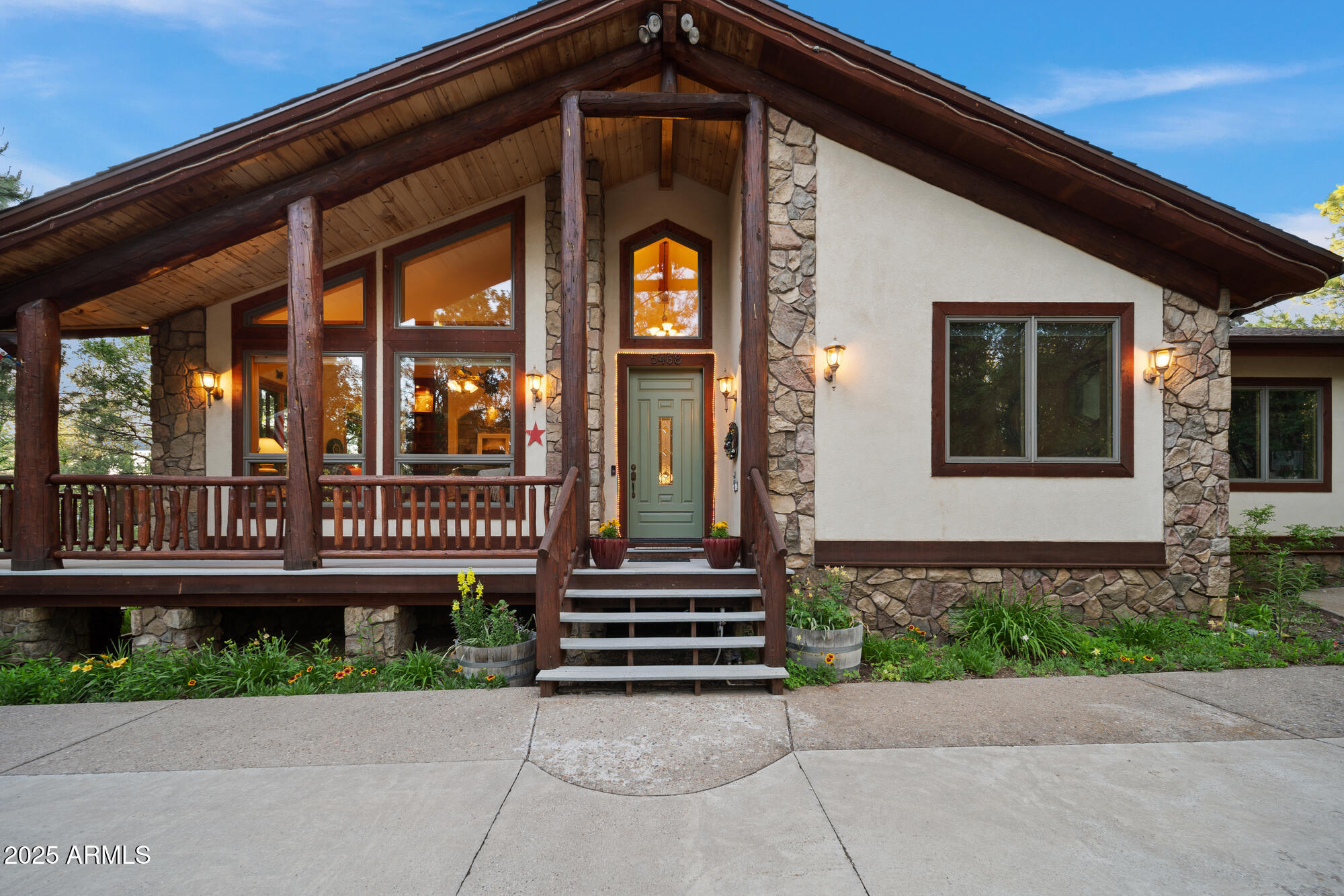 5468 Apache Trail Pinetop, AZ 85935 - Photo 11 of 73 a front view of a house with a garden