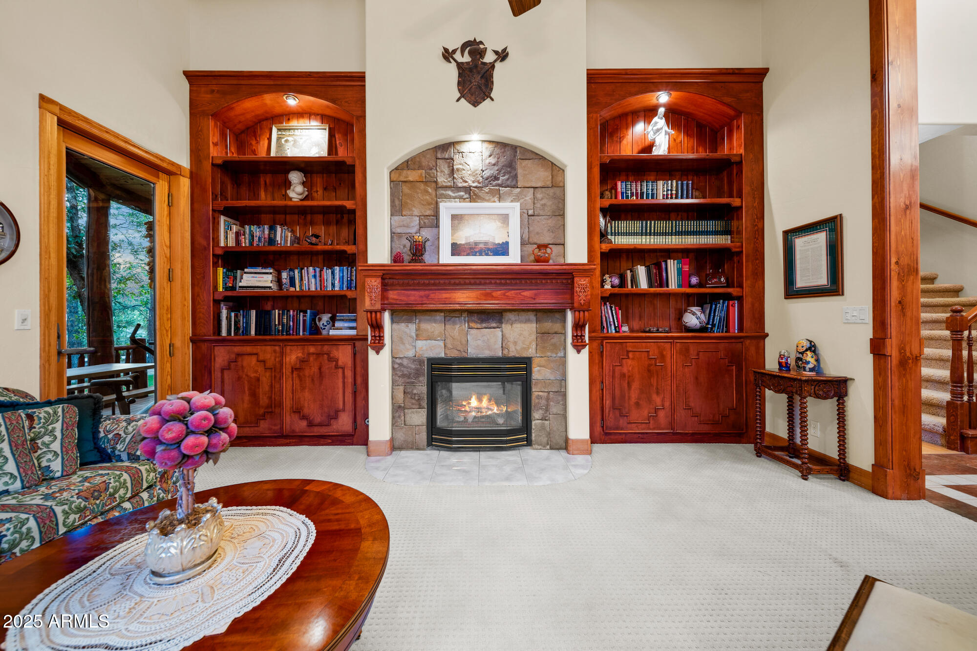 5468 Apache Trail Pinetop, AZ 85935 - Photo 25 of 73 a living room with furniture a fireplace and a flat screen tv