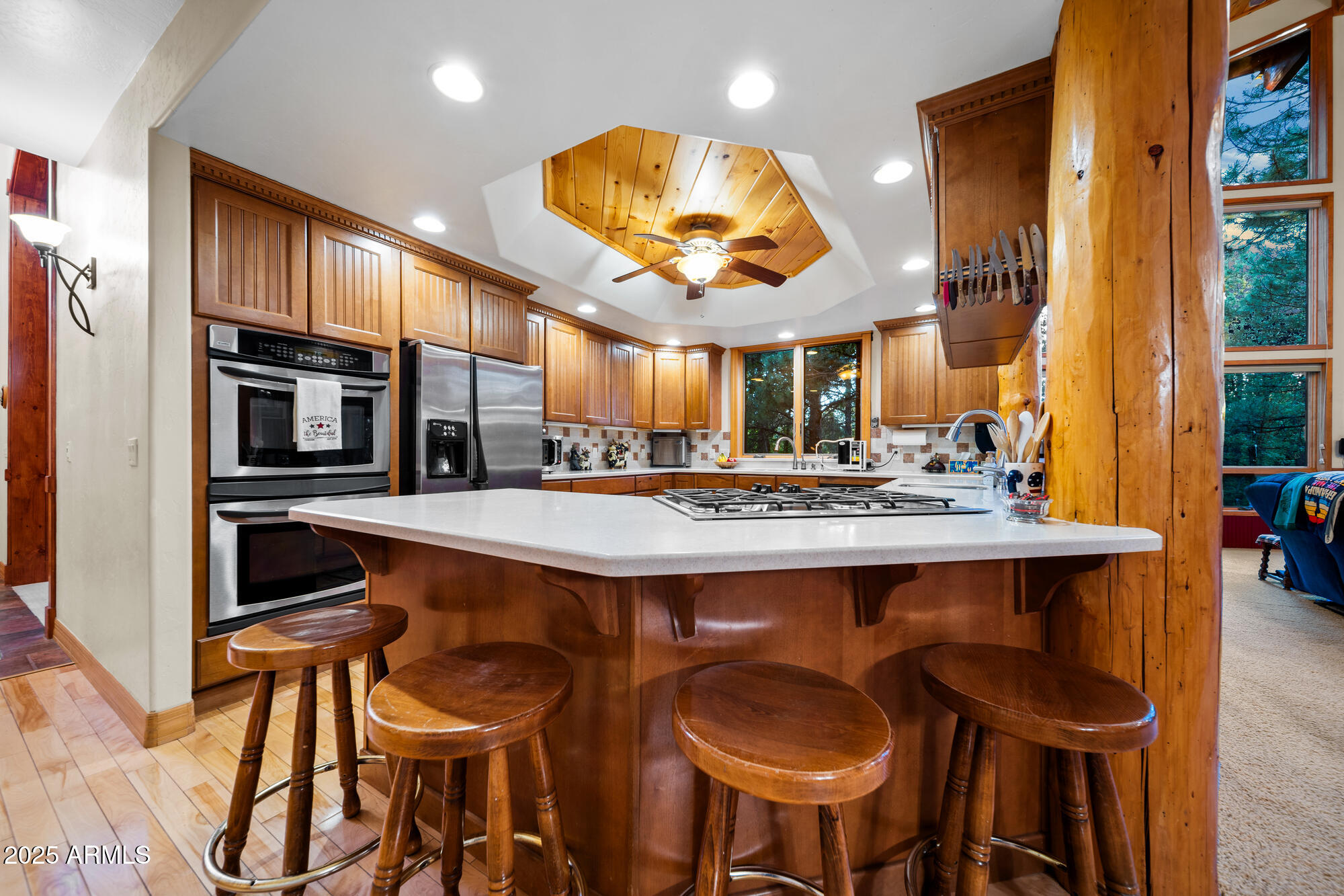 5468 Apache Trail Pinetop, AZ 85935 - Photo 36 of 73 a large kitchen with a table and chairs