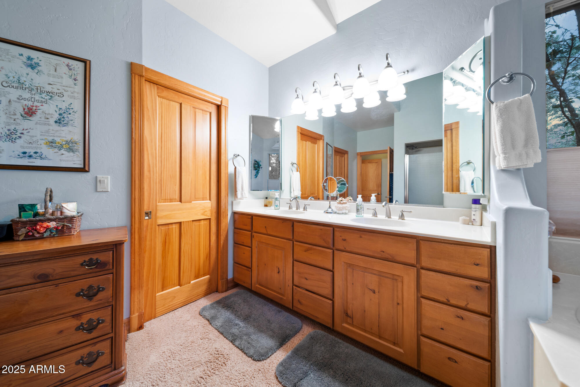 5468 Apache Trail Pinetop, AZ 85935 - Photo 42 of 73 a spacious bathroom with a double vanity sink mirror and double