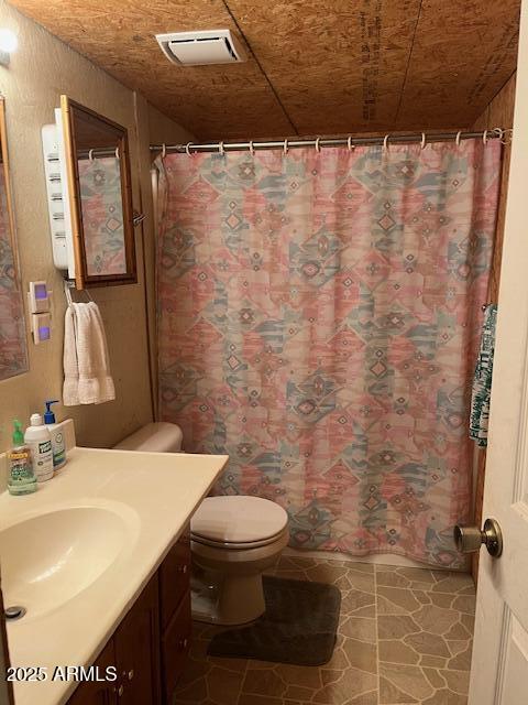 5468 Apache Trail Pinetop, AZ 85935 - Photo 63 of 73 a bathroom with a sink a toilet and shower curtain