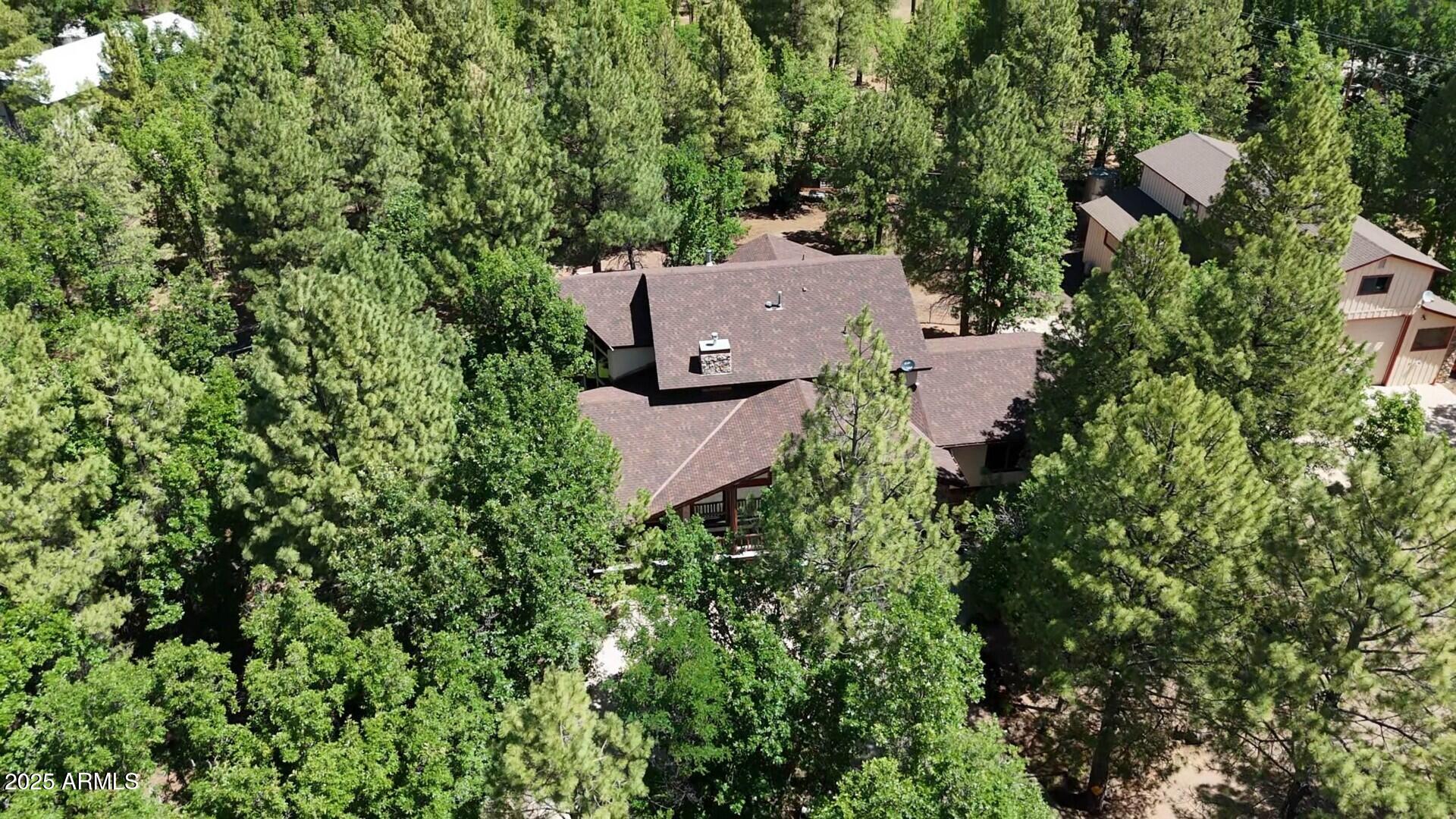 5468 Apache Trail Pinetop, AZ 85935 - Photo 69 of 73 an aerial view of house with yard