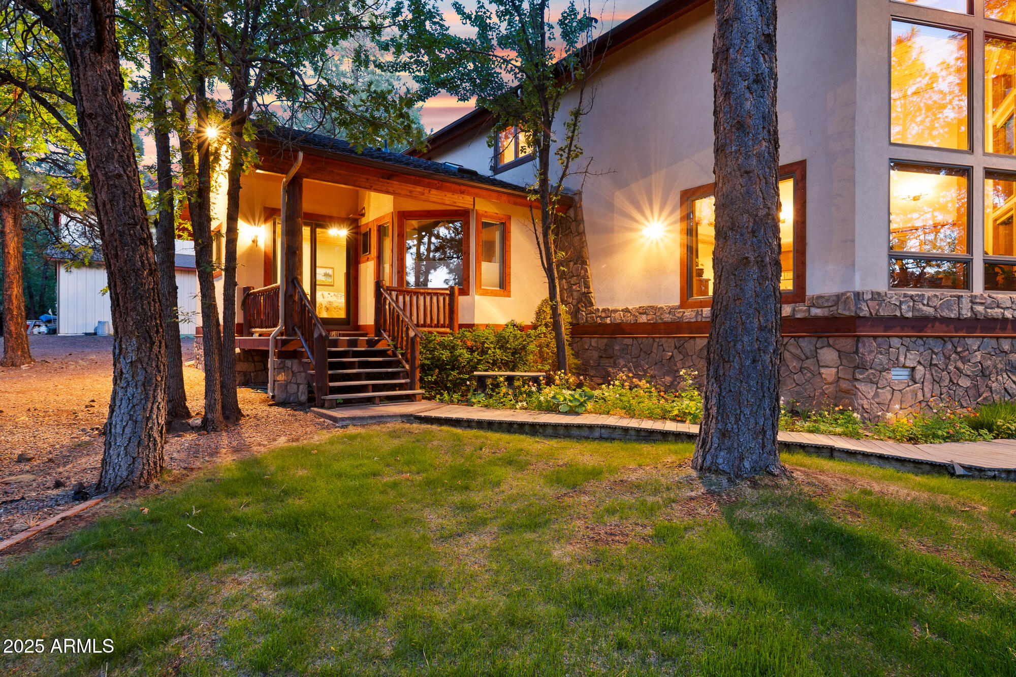 5468 Apache Trail Pinetop, AZ 85935 - Photo 7 of 73 a view of swimming pool with lawn chairs and floor to ceiling window and yard
