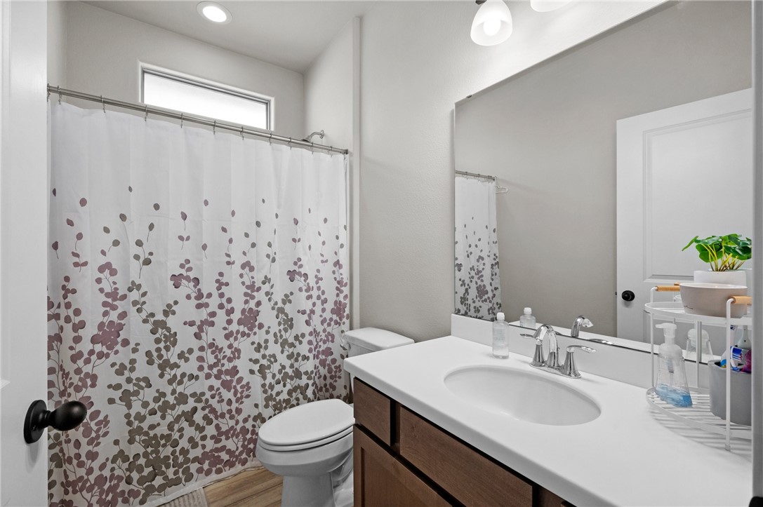 1035 Ocean Breeze Portland, TX 78374 - Photo 5 of 24 a bathroom with a sink toilet and shower