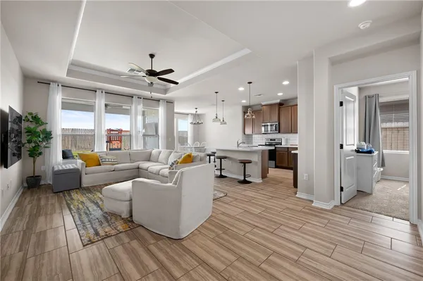 a bedroom with furniture and a window