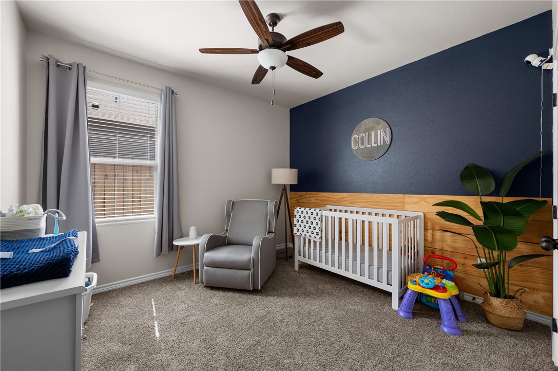 1035 Ocean Breeze Portland, TX 78374 - Photo 8 of 24 a bedroom with furniture and a window