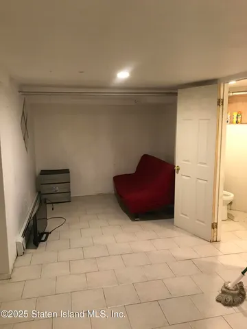 a view of room with cabinets