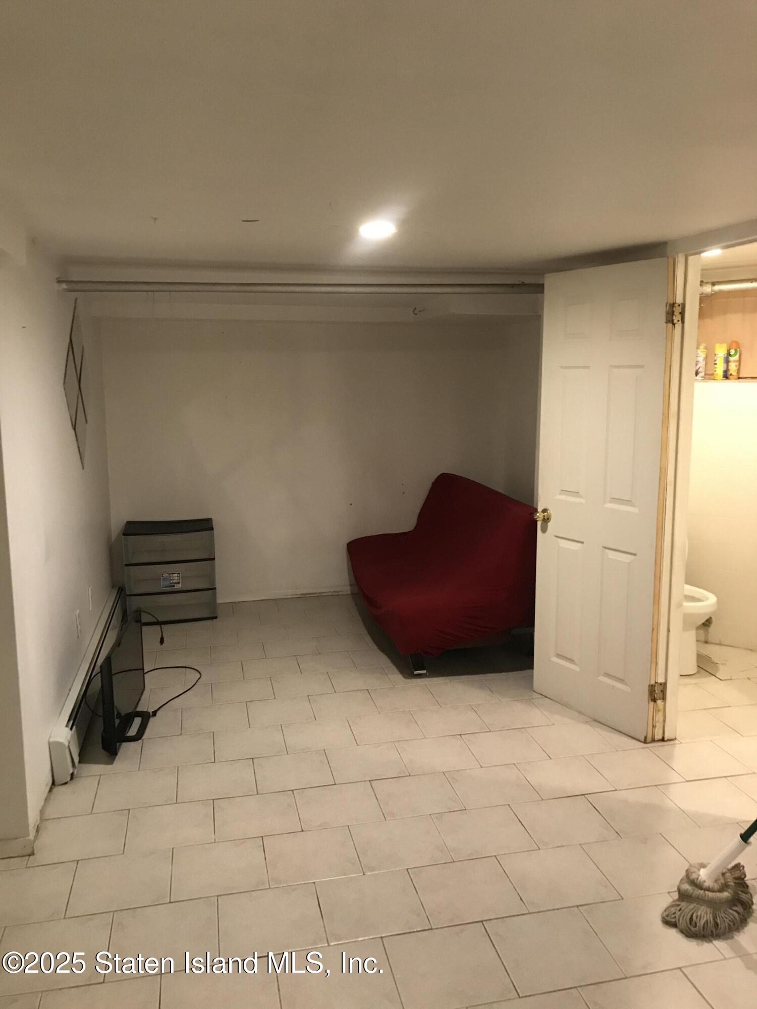 69 Narrows Road North Staten Island, NY 10305 - Photo 12 of 15 a view of room with cabinets