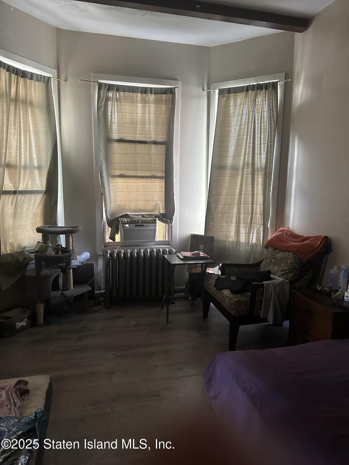 69 Narrows Road North Staten Island, NY 10305 - Photo 4 of 15 a living room with furniture