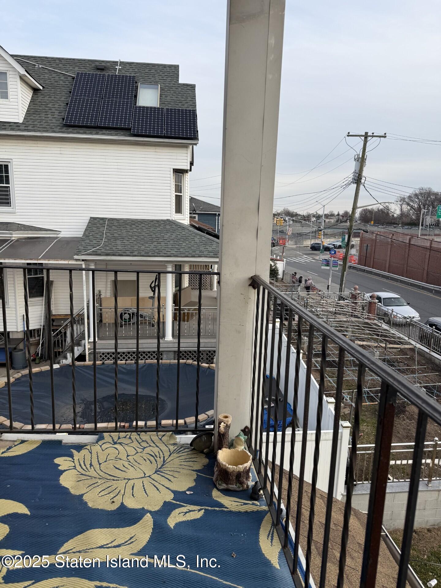 69 Narrows Road North Staten Island, NY 10305 - Photo 10 of 15 a view of a terrace with chairs
