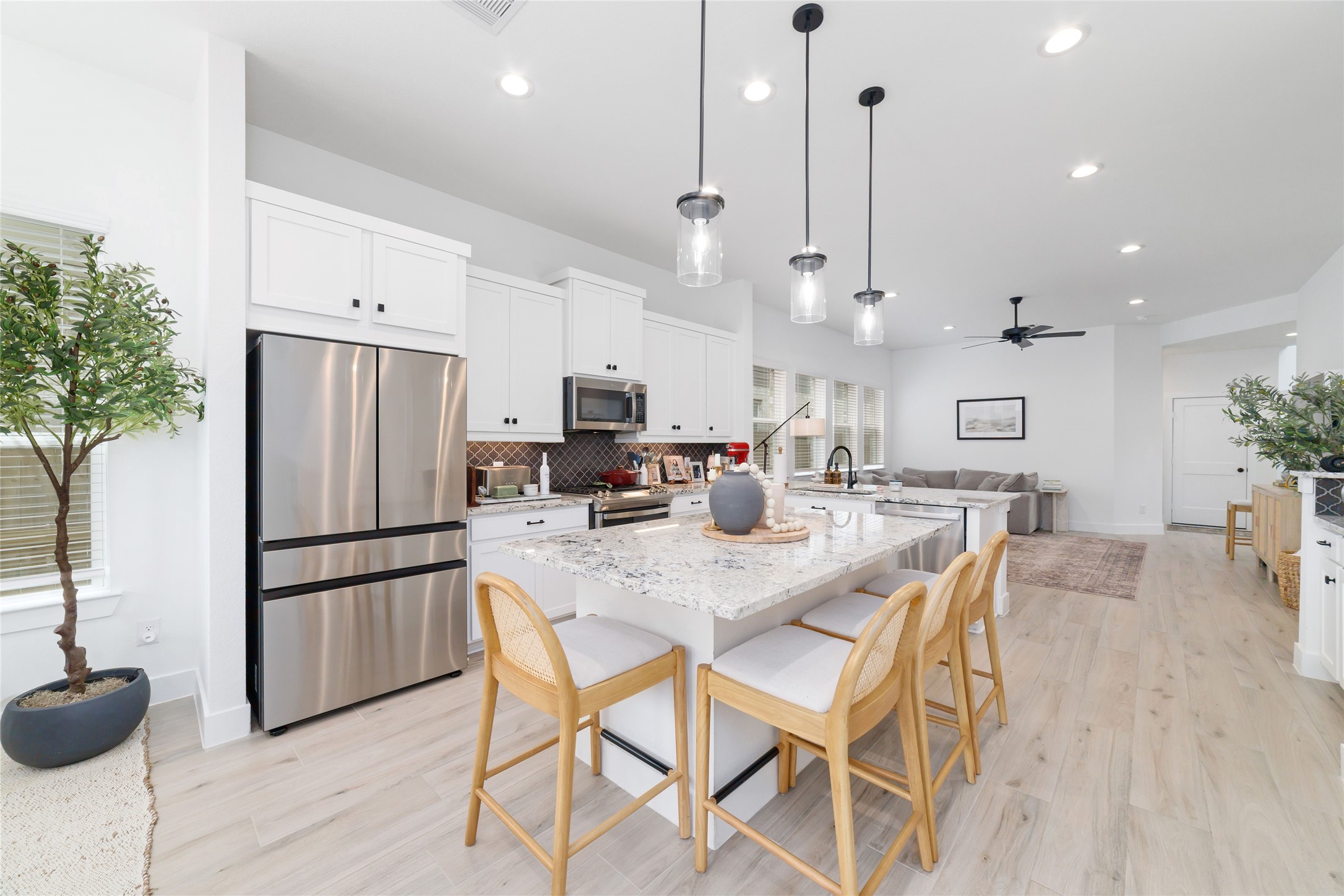 10524 Wild Rice Conroe, TX 77385 - Photo 8 of 13 gorgeous kitchen with pendant lighting