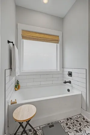 a bathroom with a sink and a bathtub