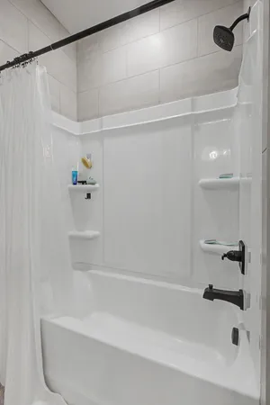 a bathroom with a bathtub