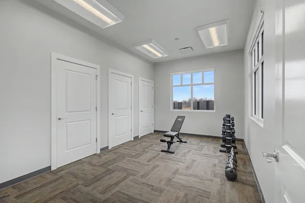 a view of a room with gym equipment