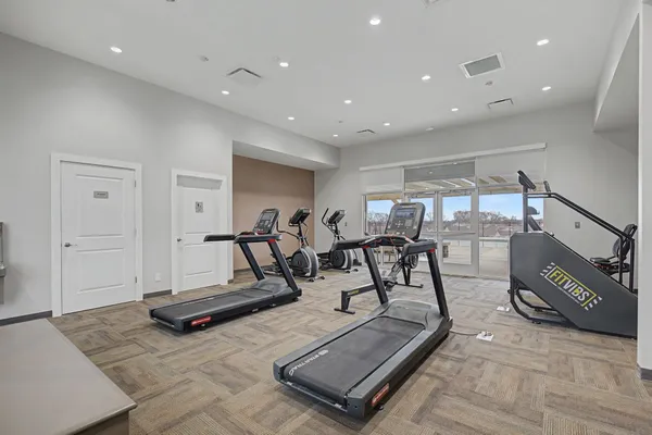 a view of a room with gym equipment