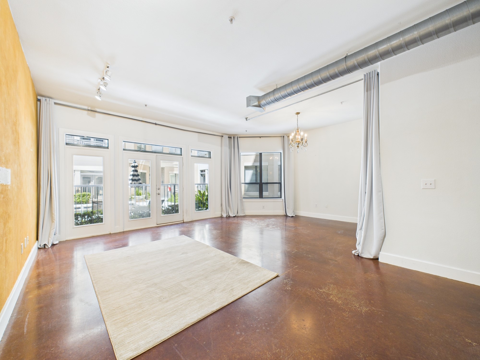 1901 Post Oak Boulevard, Unit 1405 Houston, TX 77056 - Photo 15 of 25 a view of a room with large windows