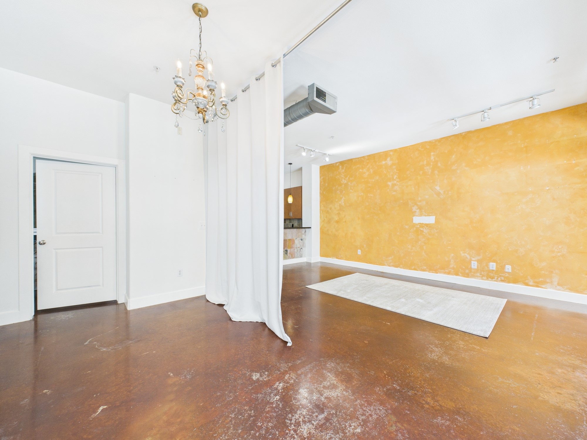 1901 Post Oak Boulevard, Unit 1405 Houston, TX 77056 - Photo 18 of 25 a view of a big room with wooden floor and windows