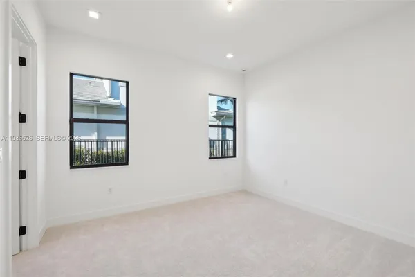 an empty room with windows