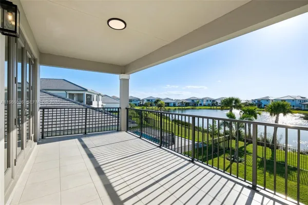 a swimming pool with outdoor seating and yard