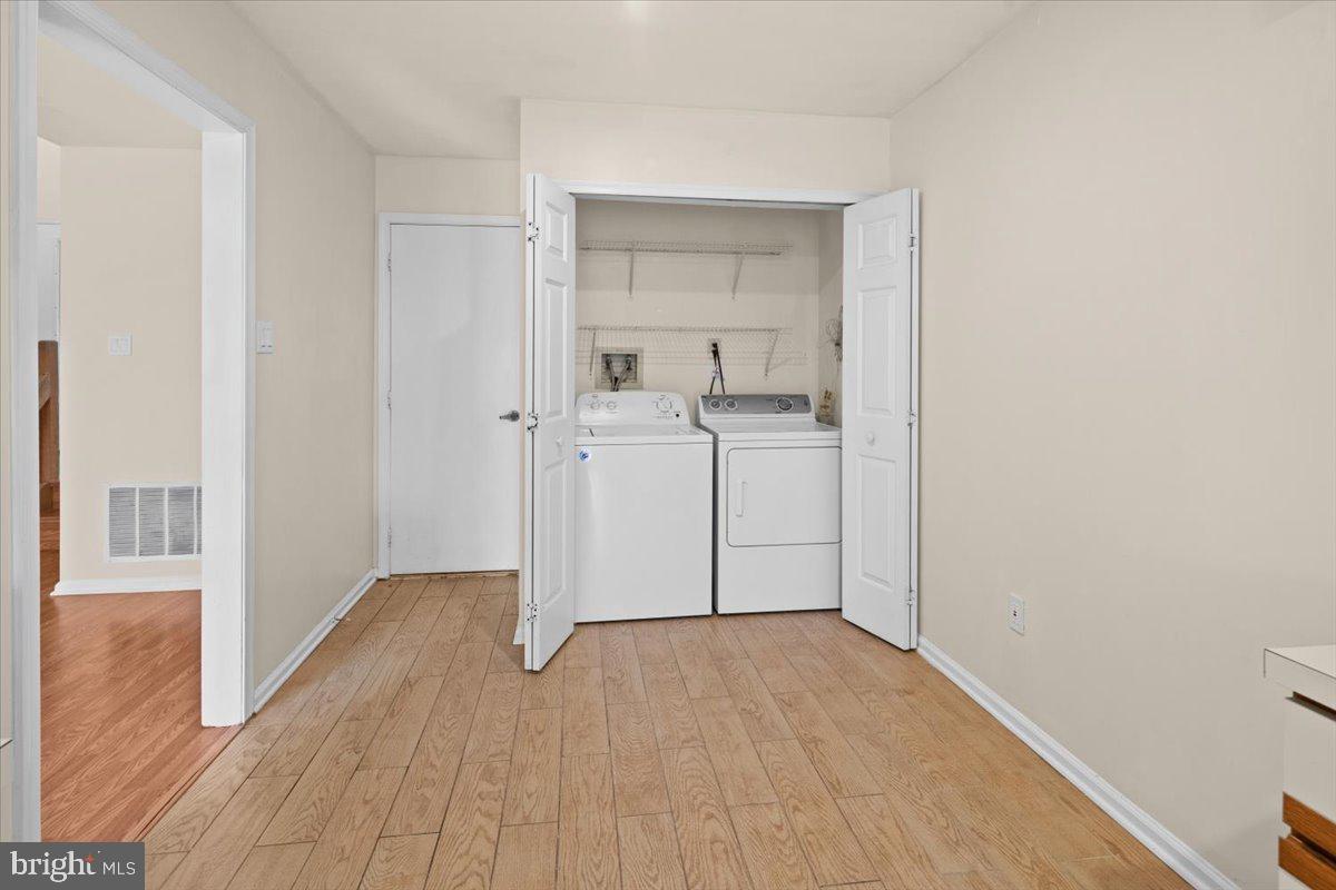 36 Needham Way Princeton, NJ 08540 - Photo 12 of 27 a view of a kitchen from the hallway