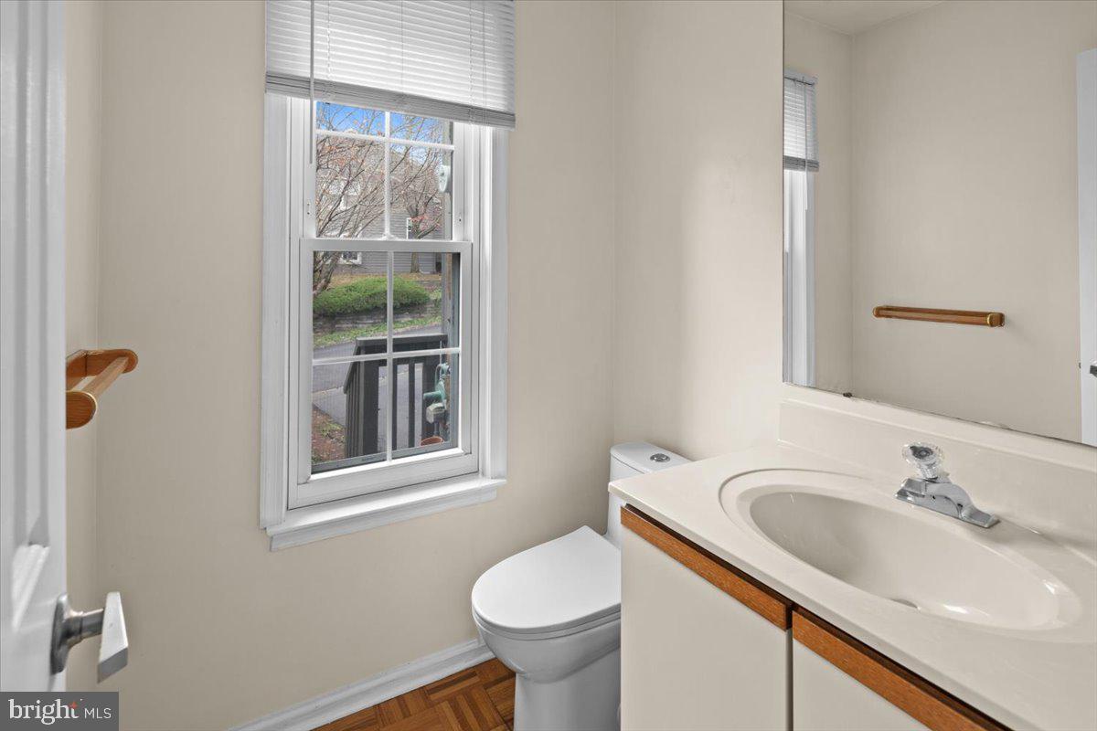 36 Needham Way Princeton, NJ 08540 - Photo 2 of 27 a bathroom with a sink toilet and a mirror