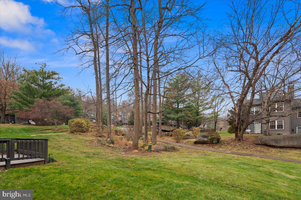 36 Needham Way Princeton, NJ 08540 - Photo 26 of 27 a view of a yard with a house in the background
