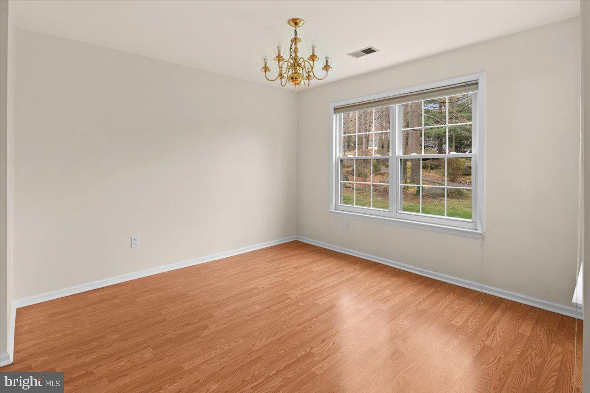36 Needham Way Princeton, NJ 08540 - Photo 7 of 27 a view of an empty room with a window