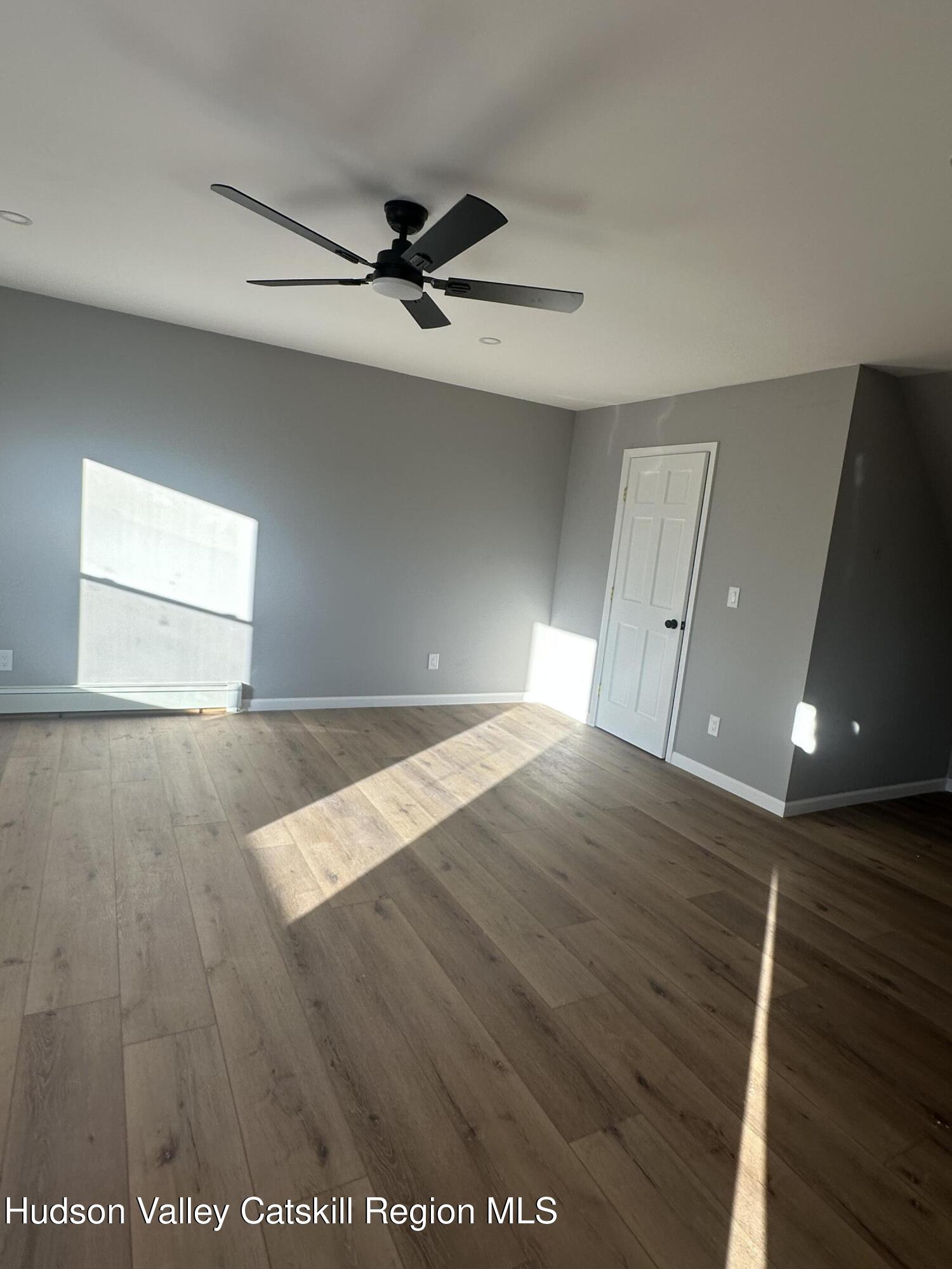 35 Olivers Way Cairo, NY 12413 - Photo 17 of 22 a view of empty room with wooden floor