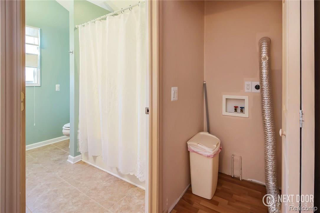 768 Hemingway Road Lake Orion, MI 48362 - Photo 28 of 53 2nd Floor Bath & Laundry area.