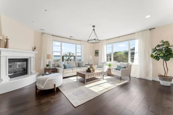 a bedroom with a large bed and a large window