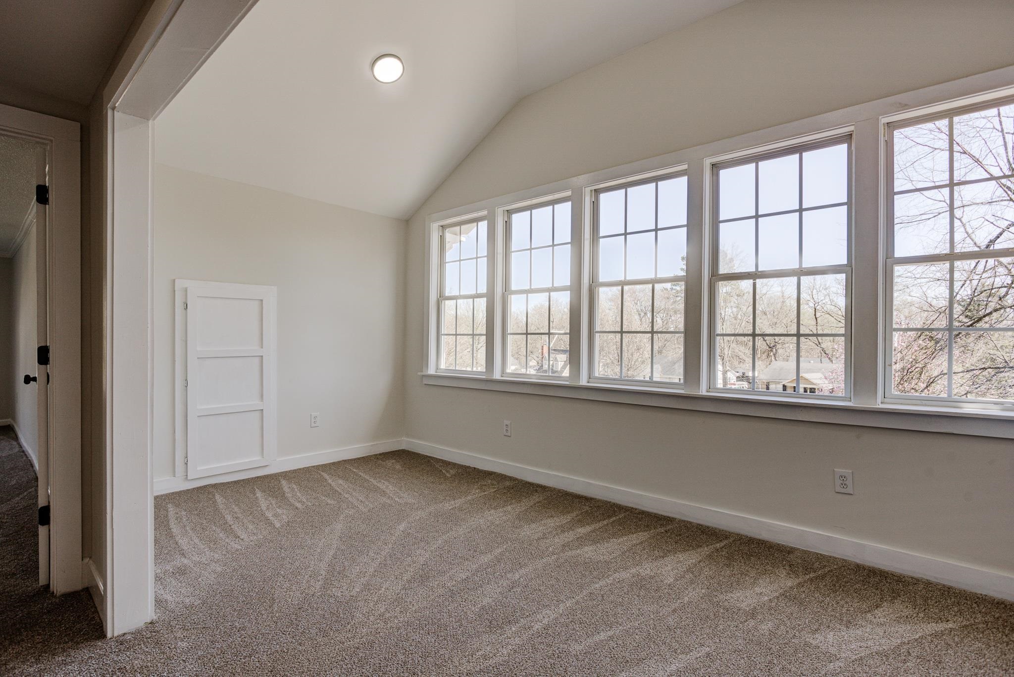 843 South Main Street Covington, TN 38019 - Photo 19 of 25 an empty room with windows