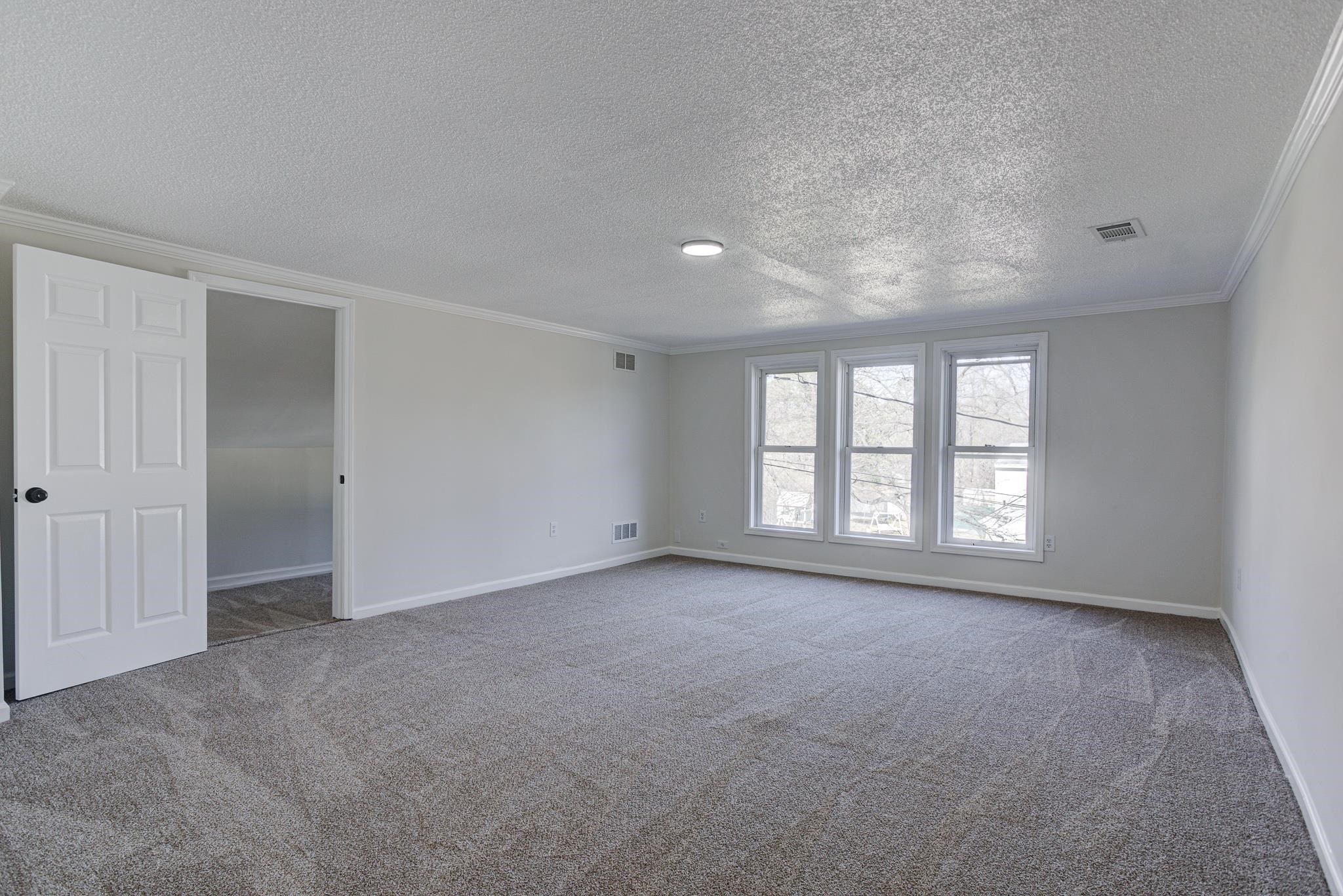 843 South Main Street Covington, TN 38019 - Photo 20 of 25 a view of an empty room with a window