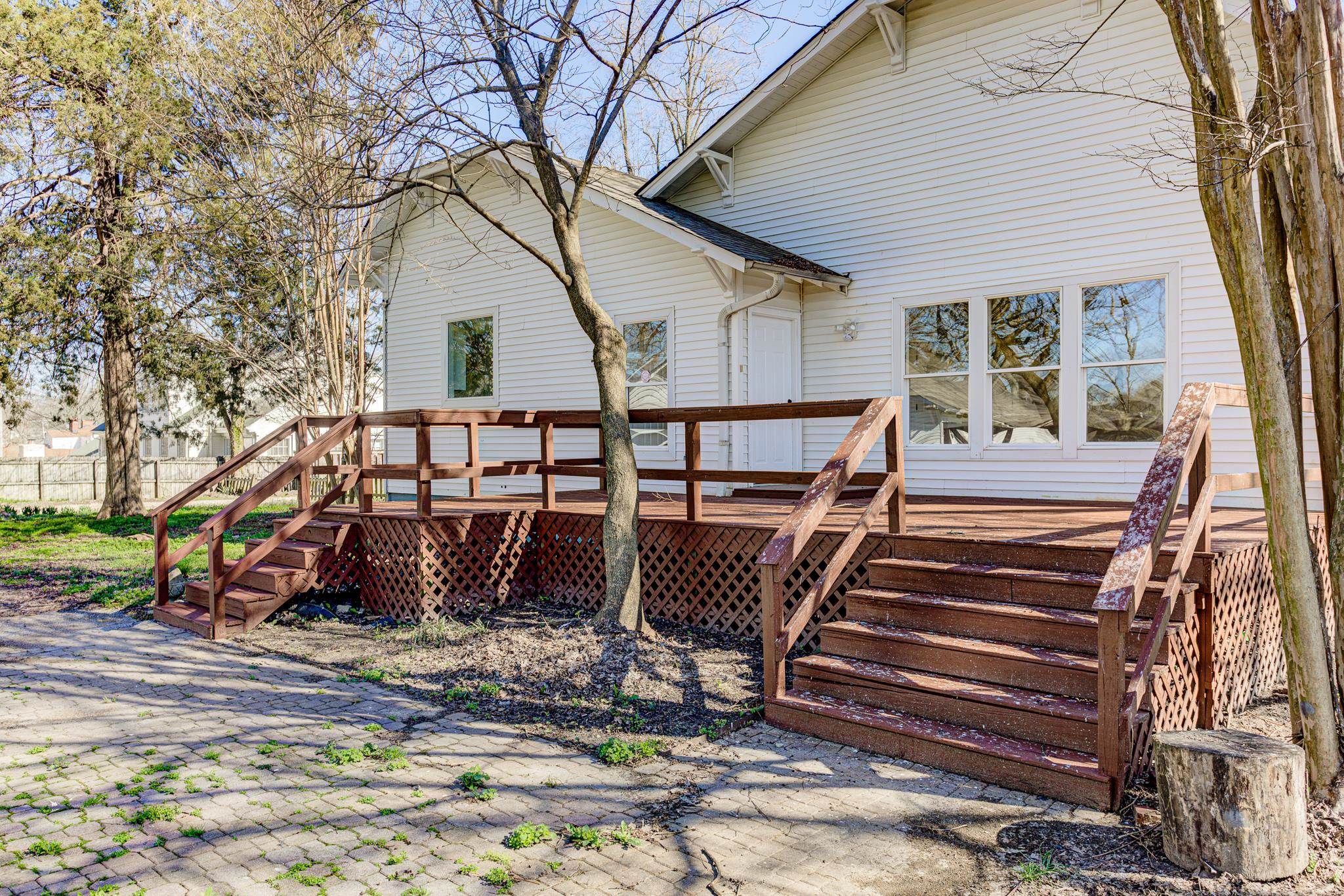 843 South Main Street Covington, TN 38019 - Photo 25 of 25 a front view of a house with a yard